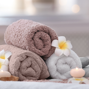 Spa Laundry Rolled Towels With Candles